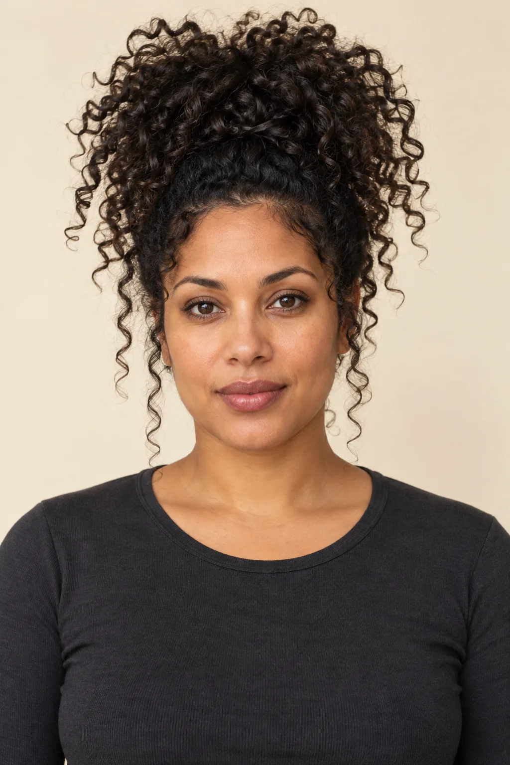 Front view of long curls loosely gathered over the crown.